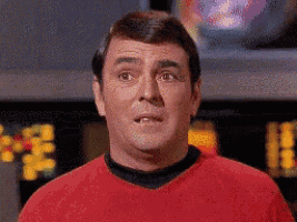 Star Trek crew looking at each other cluelessly.
