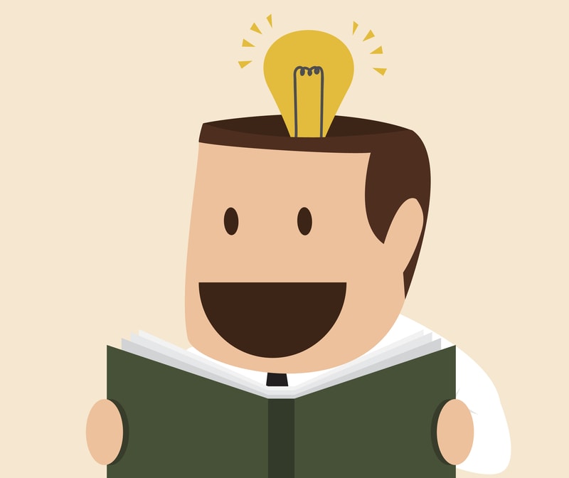 cartoon of man with idea and notebook