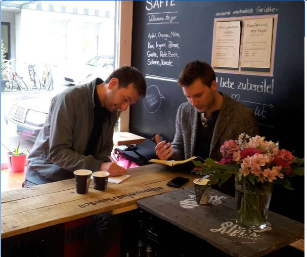 Sven and Pascal taking notes.