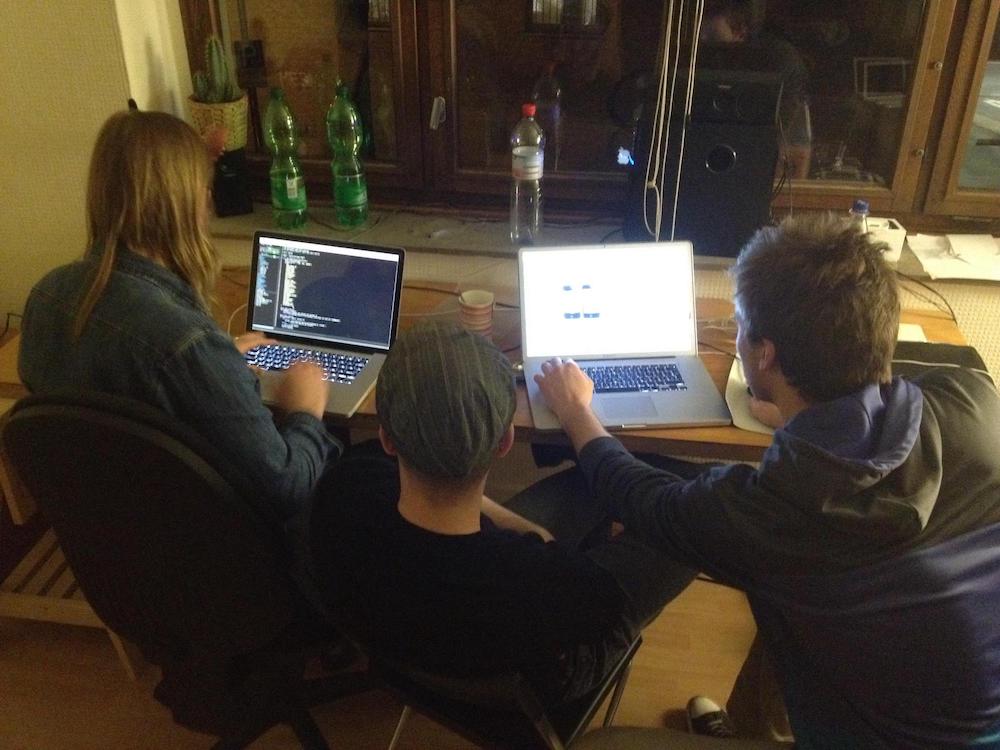 David, Peter and Pascal working in the first office.