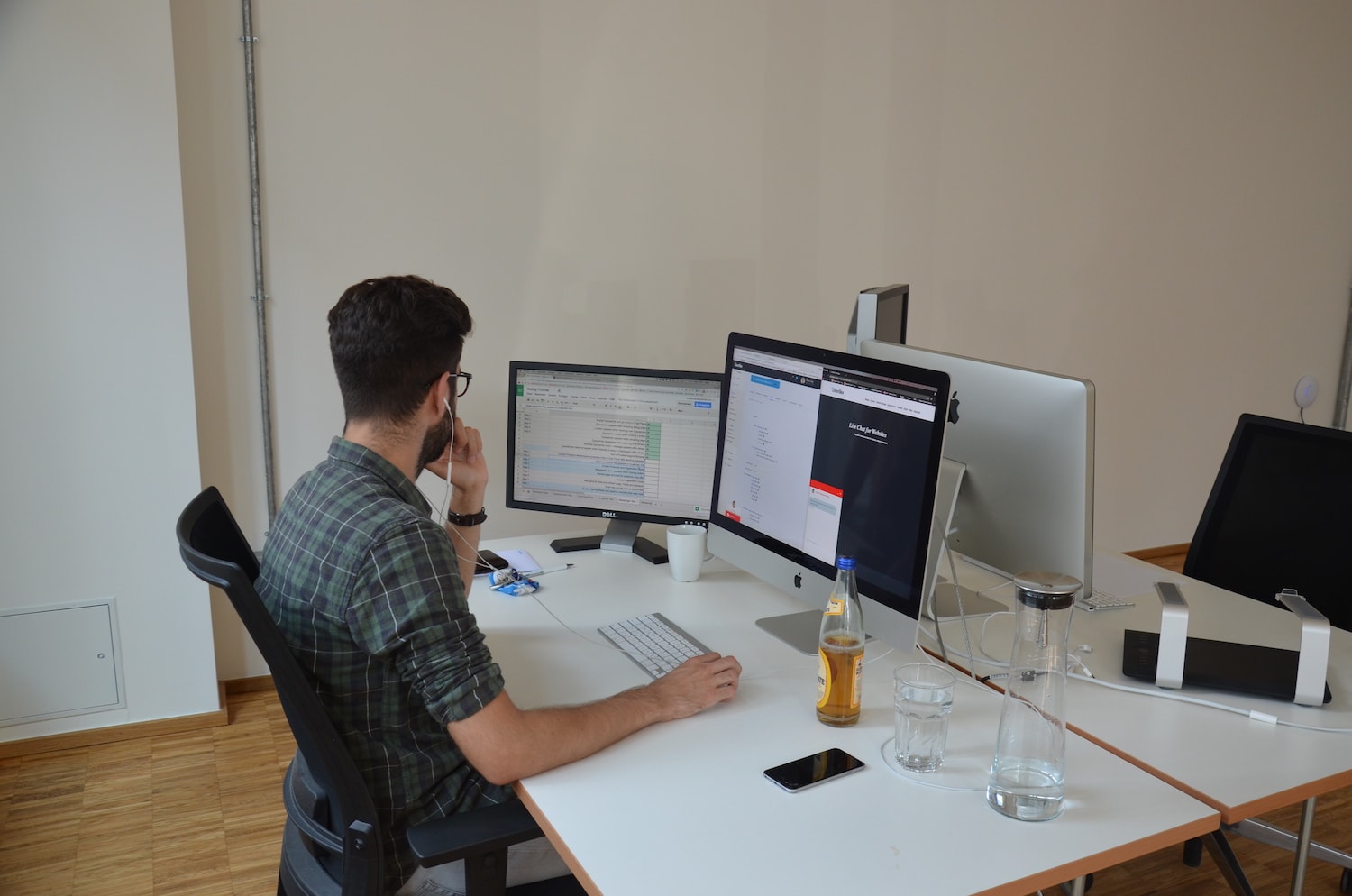 Thomas sitting at his desk.