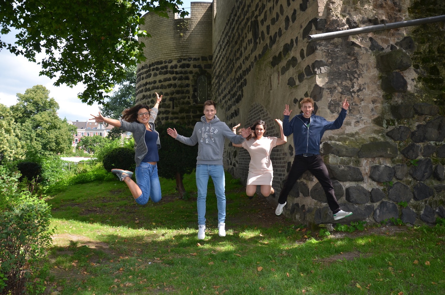 The new Userlikers jumping into the air.