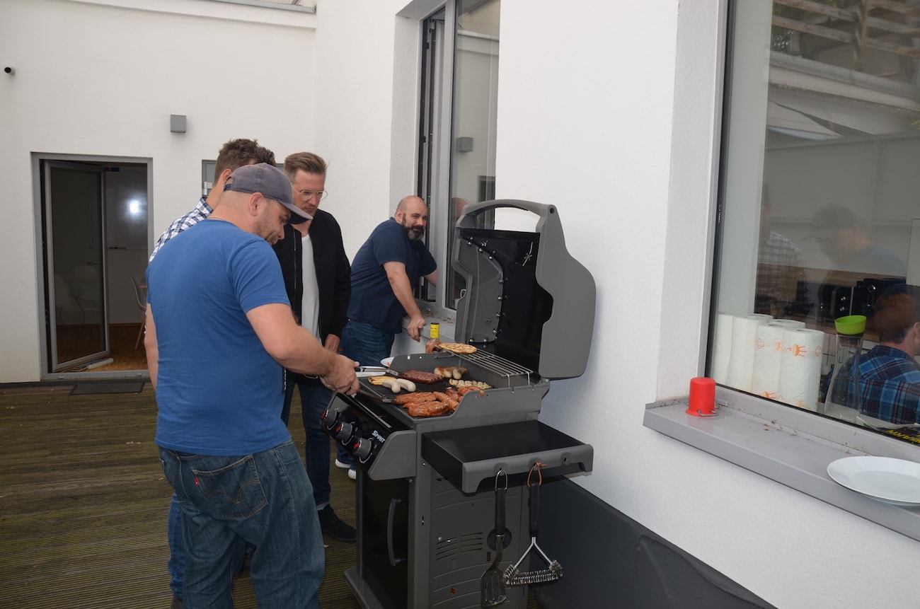 The team having a barbecue.