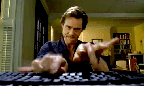 Jim Carrey being productive behind the computer.