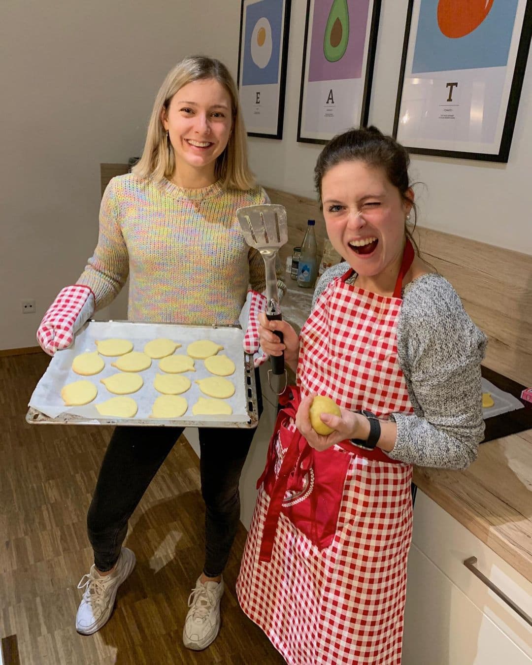 image of Tessa baking cookies with a colleague