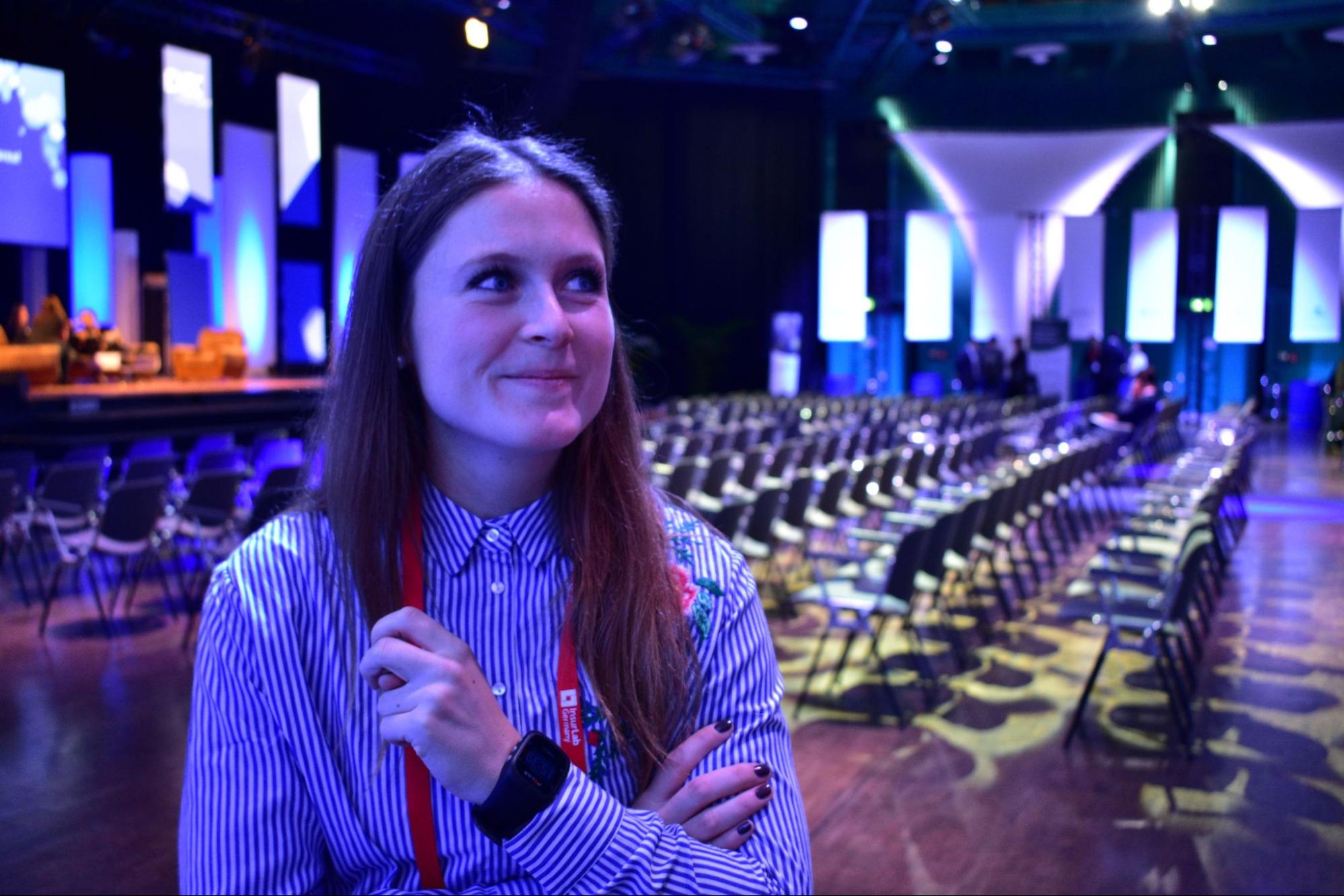 picture of Tessa smiling in a convention hall