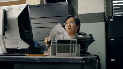 gif de deux personnes regardant un ordinateur