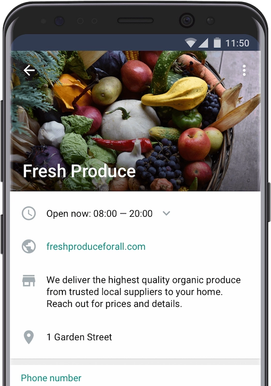 Photo of a phone showing an example for a WhatsApp business profile.