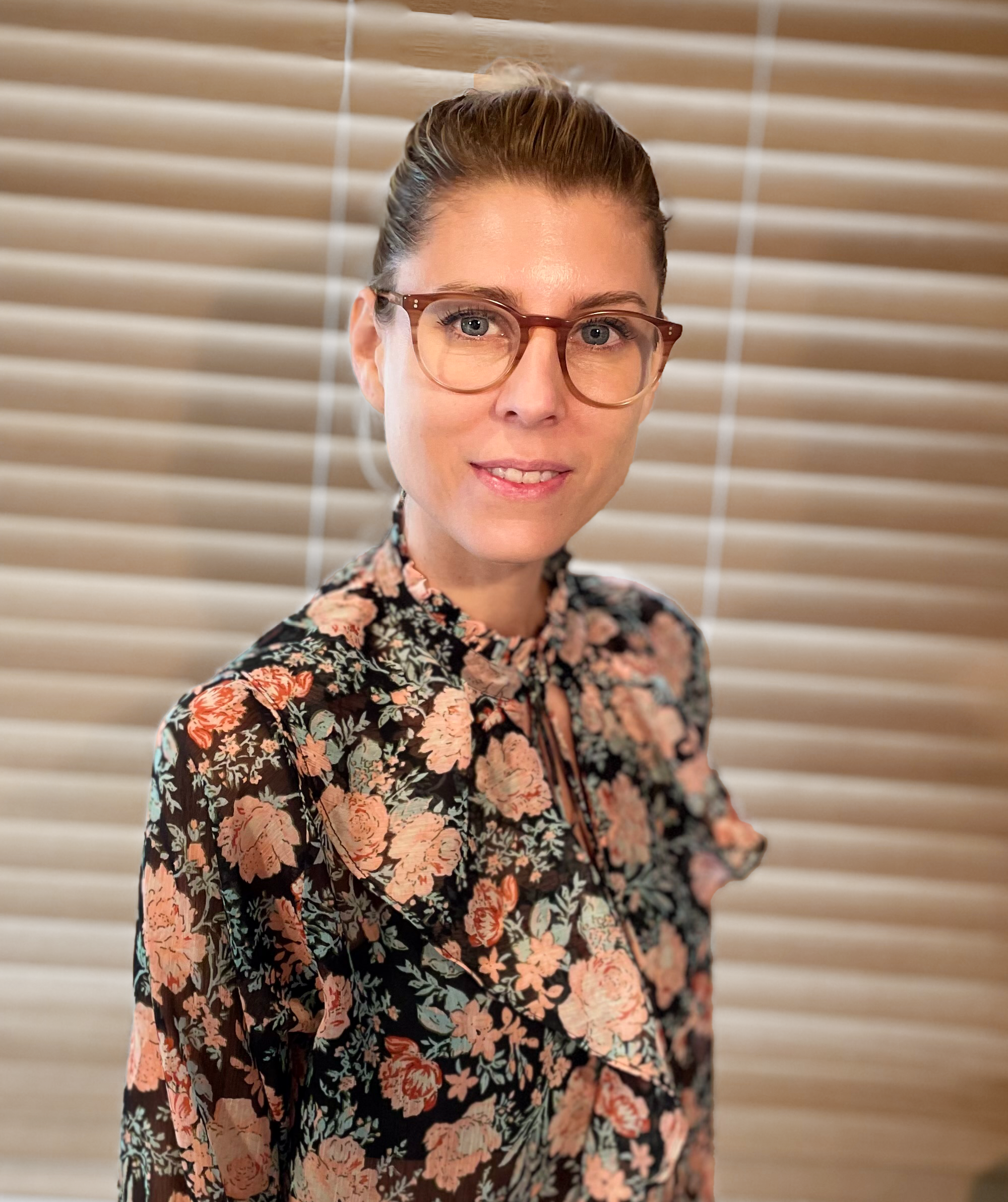 Glitchy image of a man with short hair.