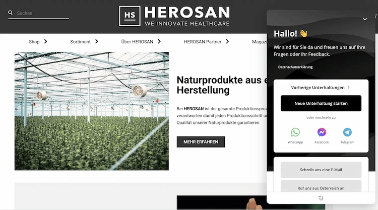 Chat interface on a computer screen with a live chat conversation, a field to type a message and a button to start a conversation. A photo of a greenhouse with a field full of plants next to a chatbot popup.