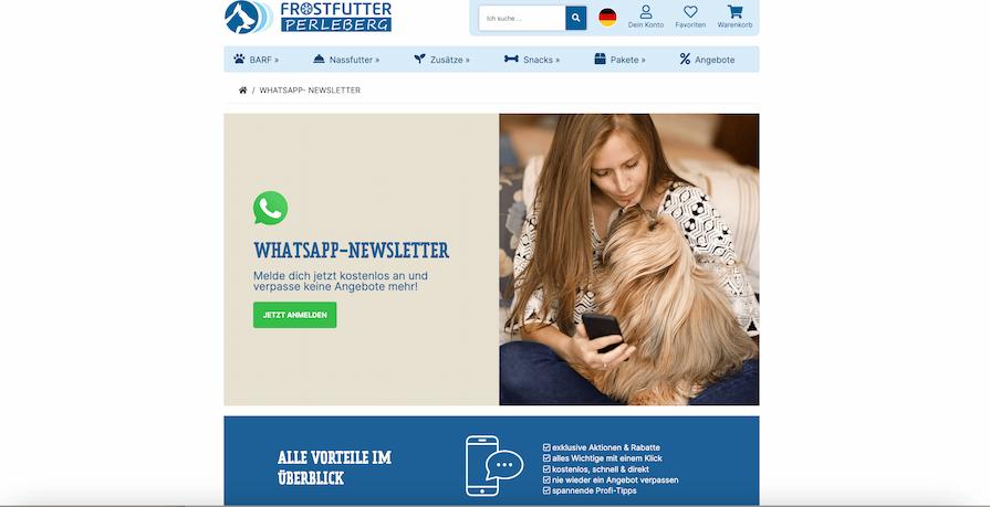 Woman sitting and holding a smartphone with a dog on her lap